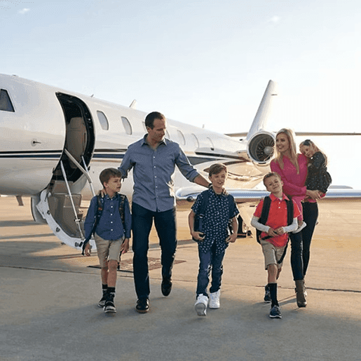 Family boarding private jet